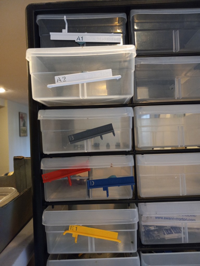 Dick's sorting system for Gundam parts.